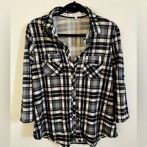 A black/white/grey square print shirt with 3/4 sleeves